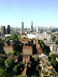 High angle view of buildings against clear sky