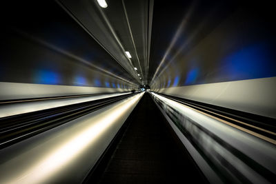 Moving walkway in illuminated building