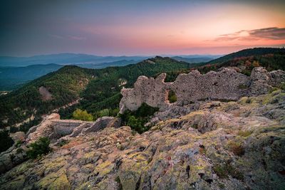 Scenic view of mountains against sky during sunset