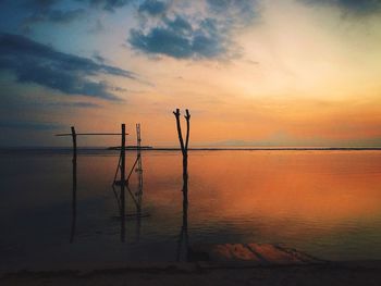 Scenic view of sea at sunset