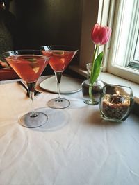 Cocktail in martini glasses on table at restaurant
