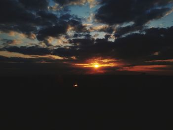 Scenic view of dramatic sky during sunset