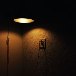 Low angle view of illuminated lamp