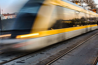 Blurred motion of train in city