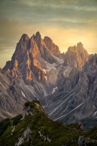 Scenic view of mountains against sky during sunset