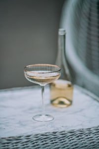 Close-up of wine in glass on table