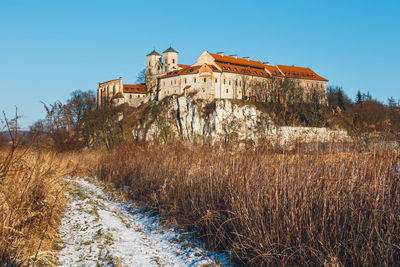 Old building against clear blue sky