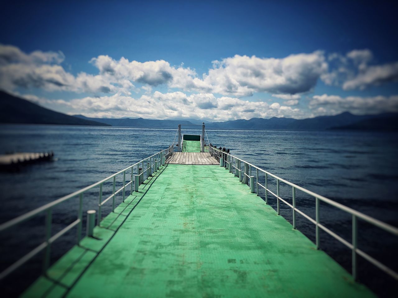 SCENIC VIEW OF PIER ON SEA AGAINST SKY