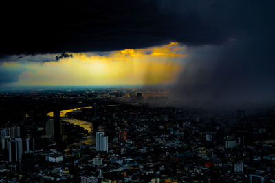 High angle view of illuminated cityscape