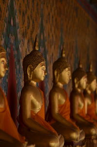 Close-up of buddha statue in temple