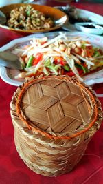 High angle view of dessert in basket on table