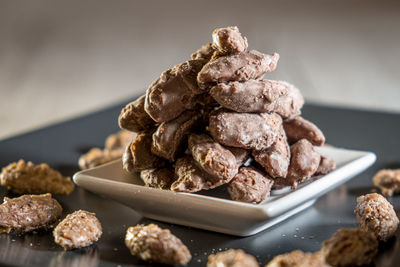 Close-up of cookies in plate on table
