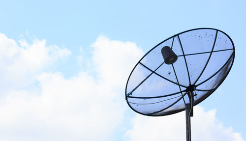 Low angle view of antenna against sky