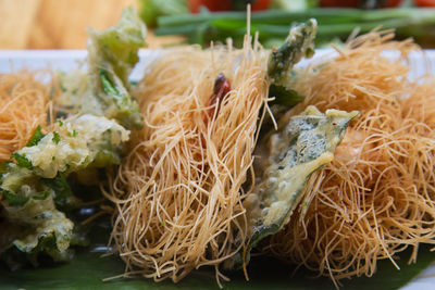 Close-up of noodles in plate on table