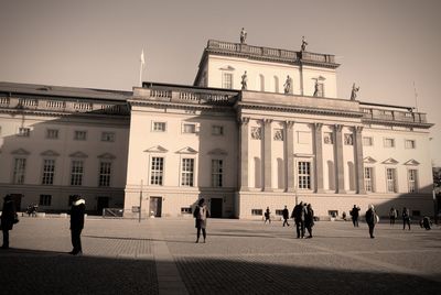 Group of people in front of building