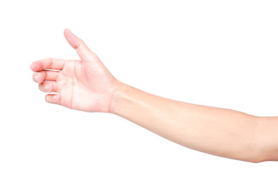 Close-up of hand over white background