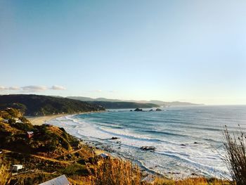 Scenic view of beach against sky