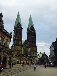 View of cathedral in city against sky