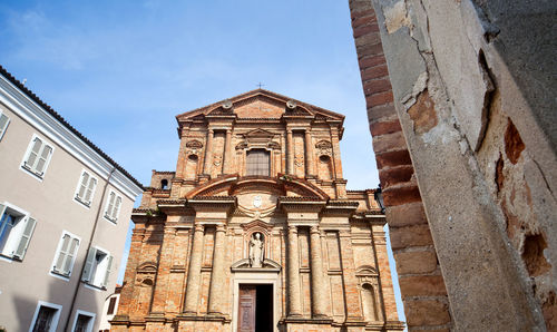 Low angle view of historic building against sky