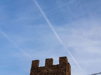 Low angle view of vapor trail in sky