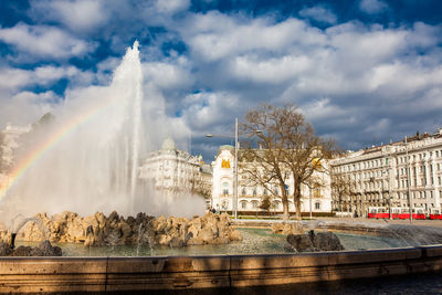 View of the beautiful buildings at vienna city center and the fountain at schwarzenbergplatz