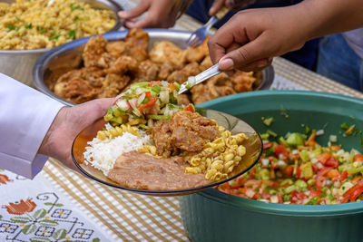 Simple and traditional brazilian food being served  for the local low-income population.