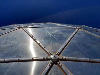 Low angle view of metal structure against sky 