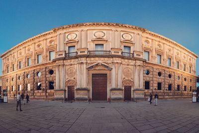 Palace of charles v against sky