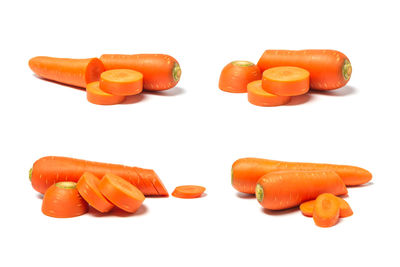 Close-up of orange bell peppers against white background