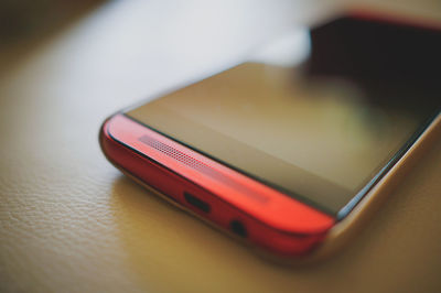 High angle view of mobile phone on table