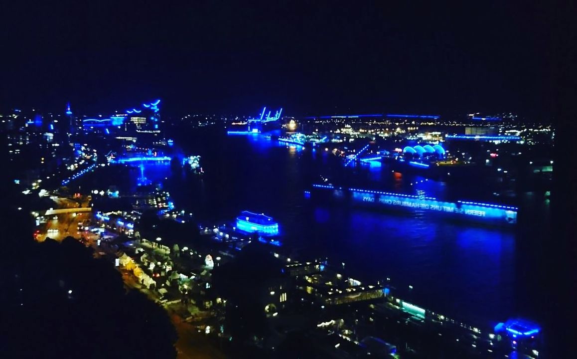 ILLUMINATED CITY AT NIGHT