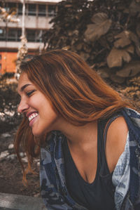 Close-up of smiling woman outdoors