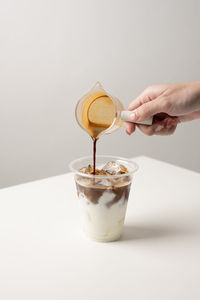 Cropped hand of person holding ice cream