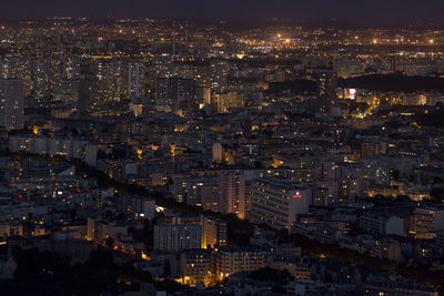 Illuminated cityscape at night