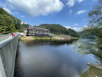 Bridge over river against sky