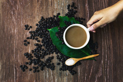 High angle view of coffee cup on table