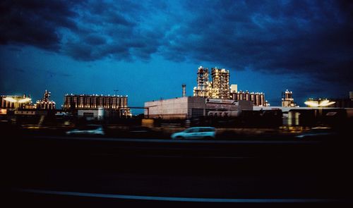 Buildings in city at night