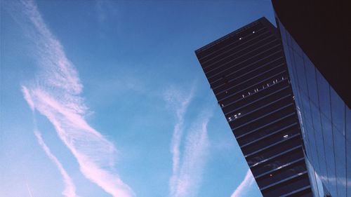 Low angle view of built structure against blue sky