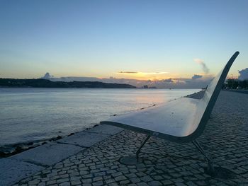 Scenic view of sea against sky at sunset