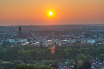 High angle view of townscape against sky during sunset