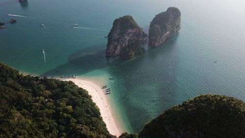 High angle view of cliff by sea