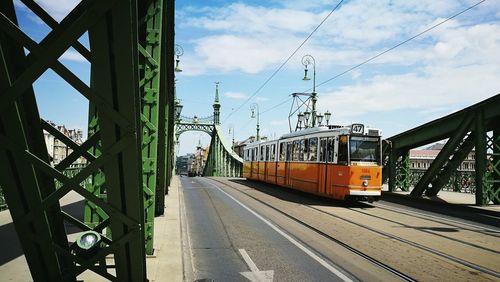 Train on railroad track against sky