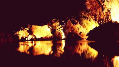 Rocks in water at night