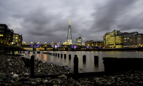 Illuminated city at waterfront