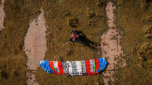 Low section of man standing on street