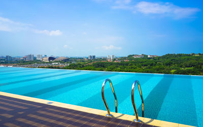 Swimming pool against blue sky