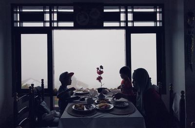Family doing lunch in restaurant