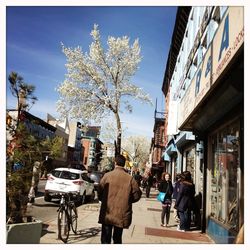 People walking on city street