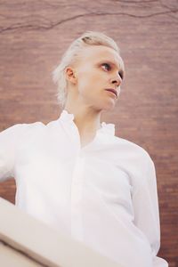 Close-up of young woman looking away