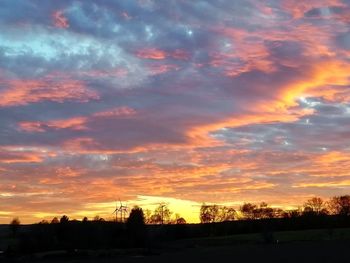 Scenic view of dramatic sky during sunset